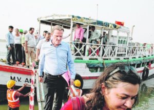 Onno Ruhl, the country director of World Bank, India, steps down from a boat after an inspection of the ghats being developed under the Ganga riverfront development project in Patna on Friday. 